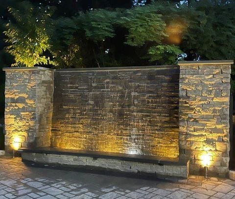 Corporate courtyard reflecting pool installation.